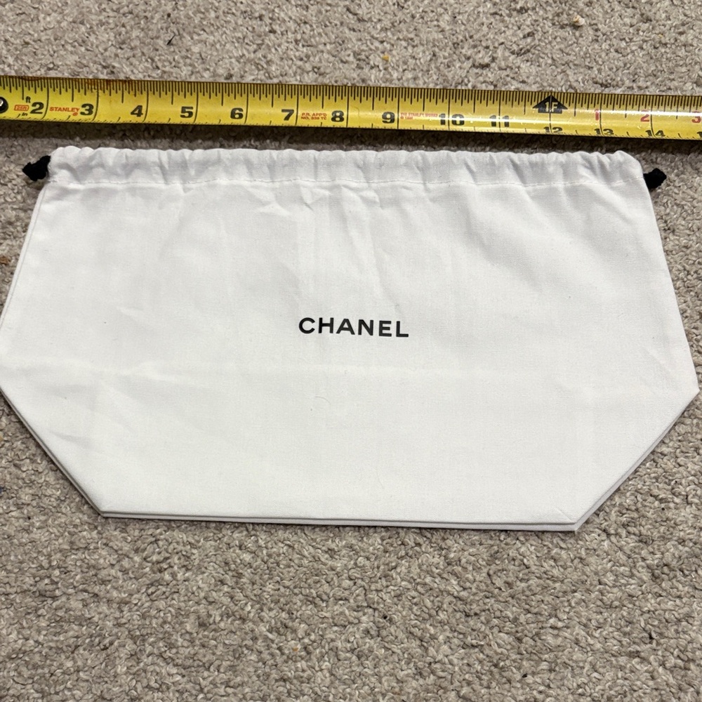 CHANEL White Drawstring Pouch with Black Logo